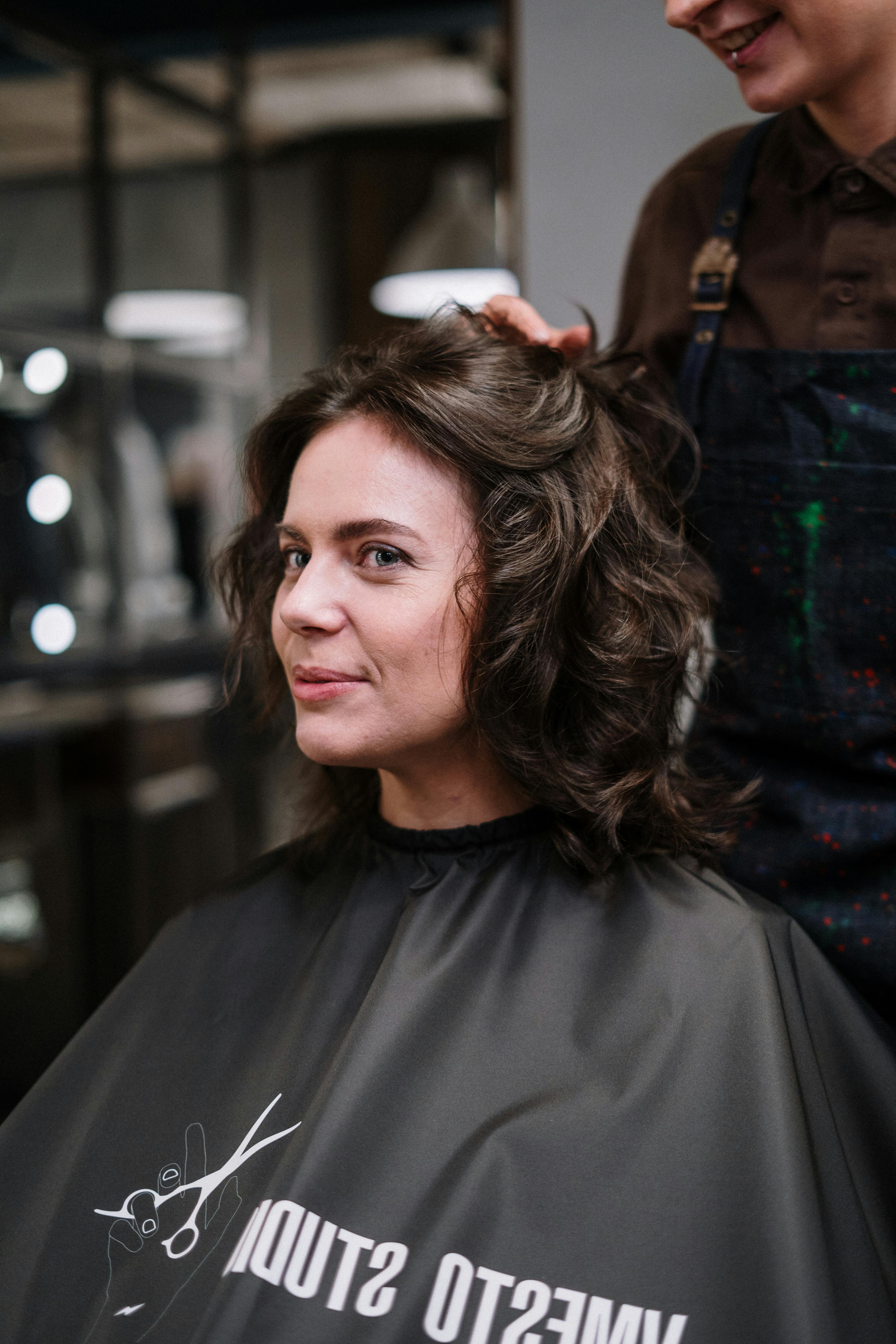Women’s haircut — stylist shaping and finishing in salon